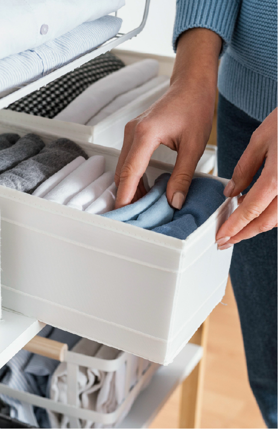 Person organizing clothes